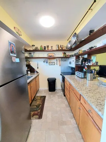 a living room with furniture and rug