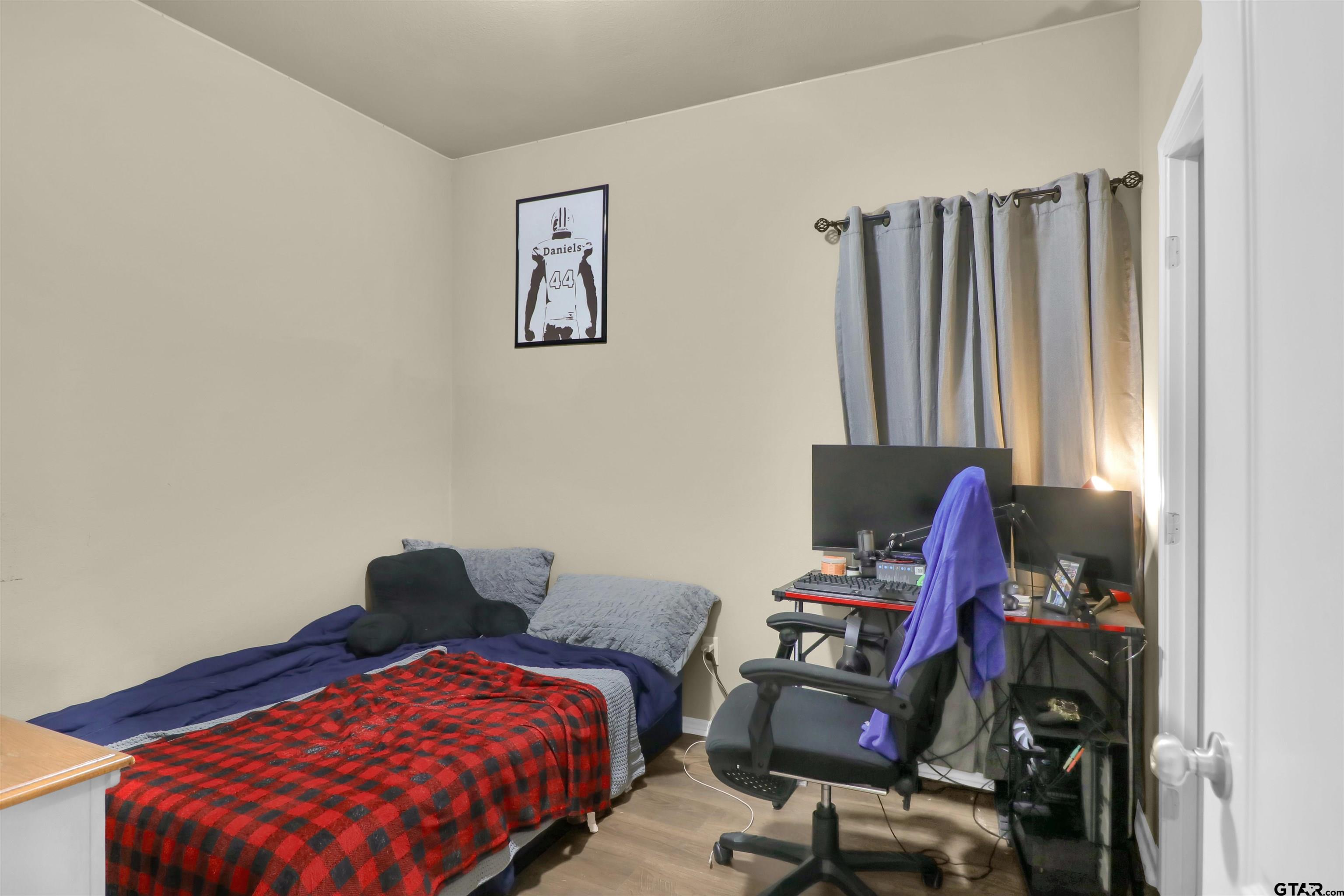 514 County Road 1201 Rusk, TX 75785 - Photo 13 of 29 a bedroom with bed and a window