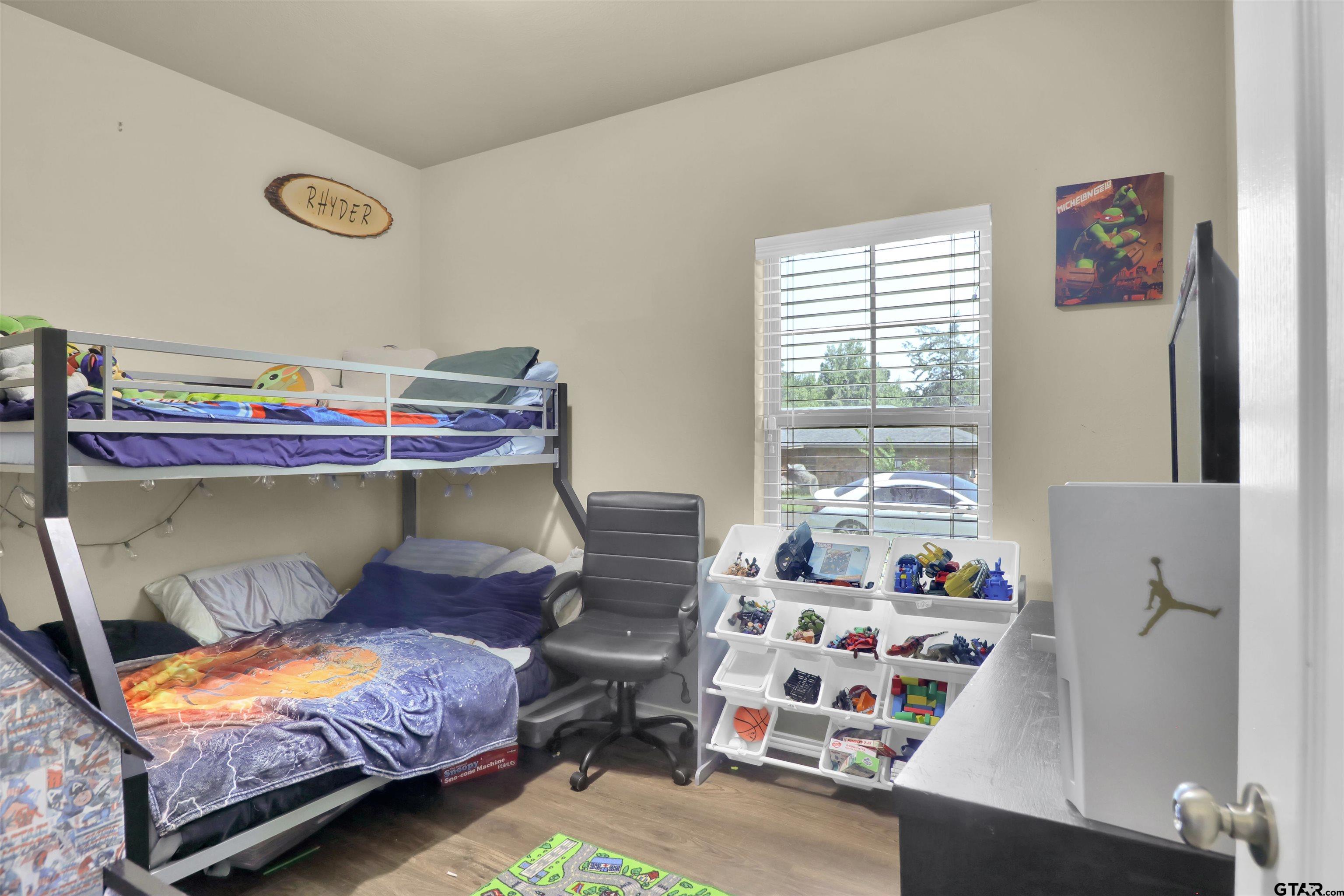 514 County Road 1201 Rusk, TX 75785 - Photo 14 of 29 a bedroom with bed and a window