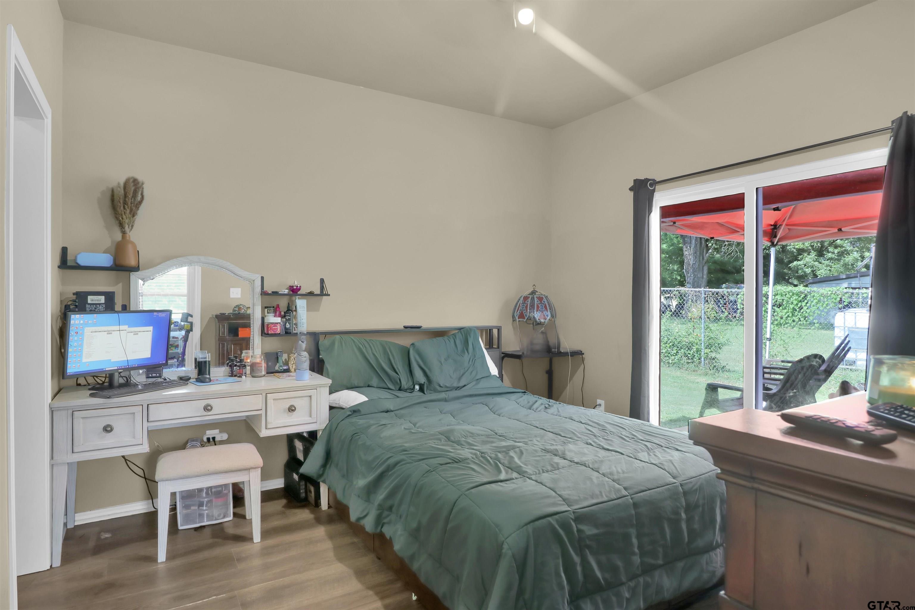 514 County Road 1201 Rusk, TX 75785 - Photo 15 of 29 a bedroom with a bed and a large window