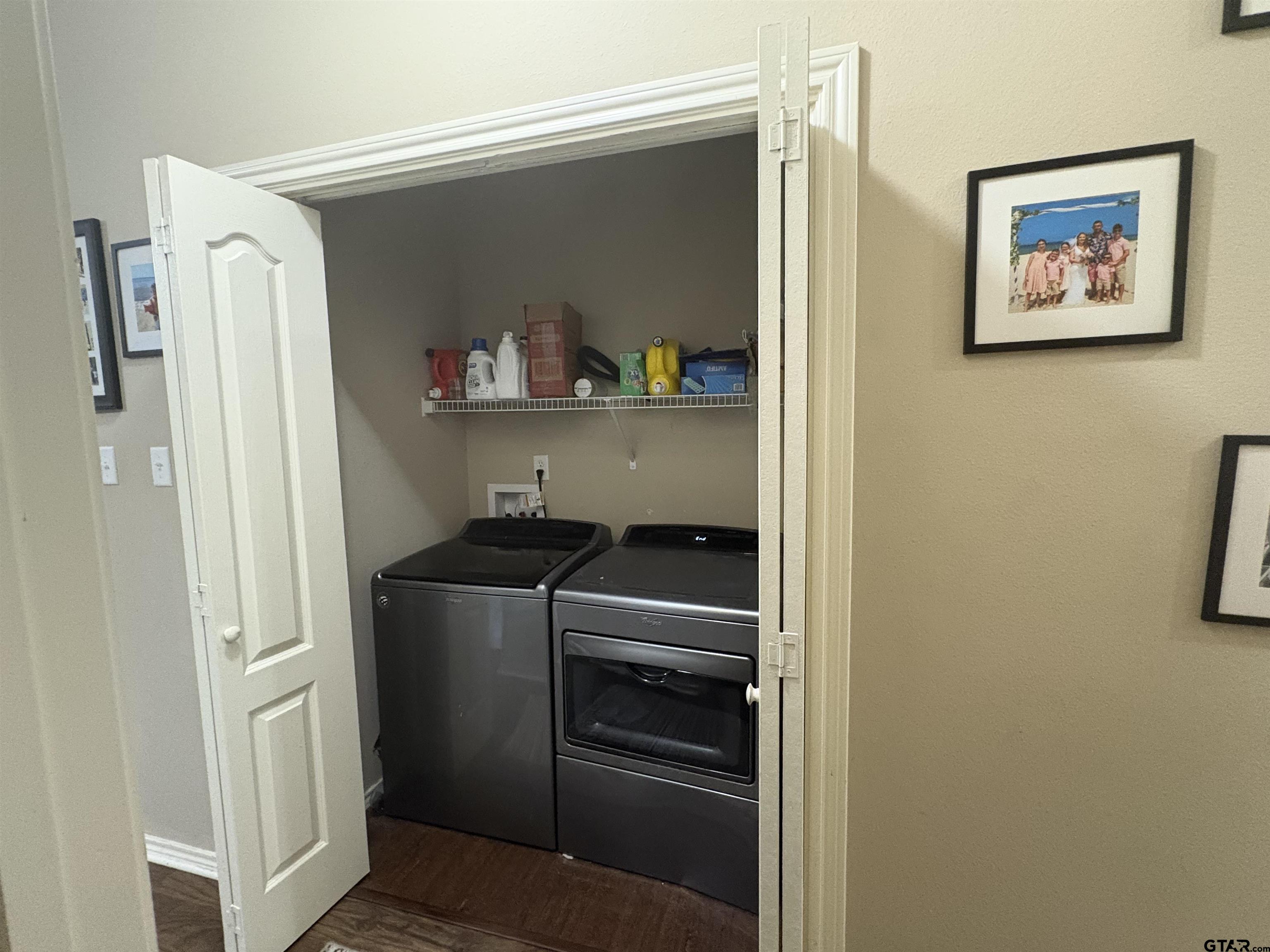 514 County Road 1201 Rusk, TX 75785 - Photo 22 of 29 a kitchen with a refrigerator and cabinets