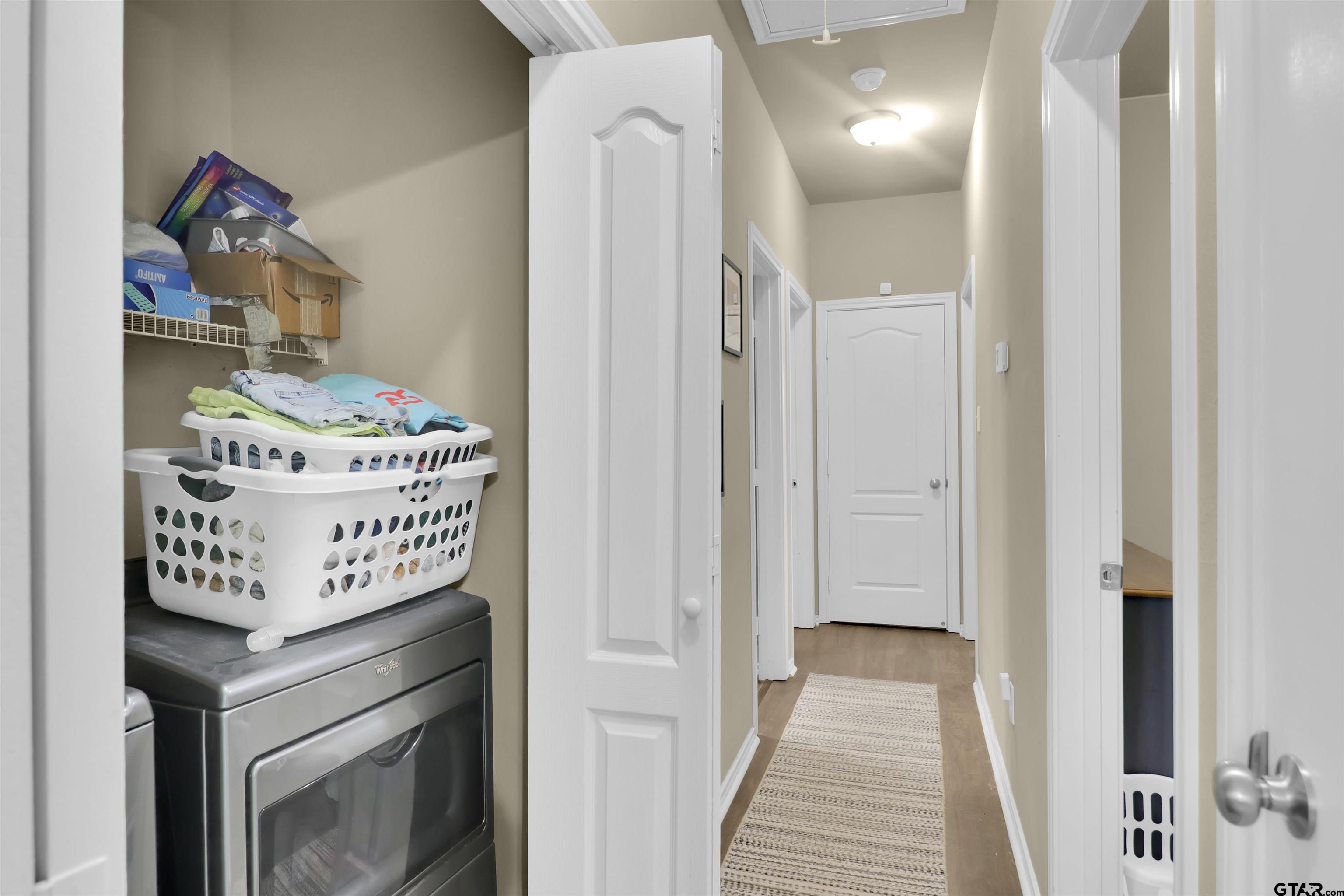 514 County Road 1201 Rusk, TX 75785 - Photo 23 of 29 a view of a hallway with washer and dryer
