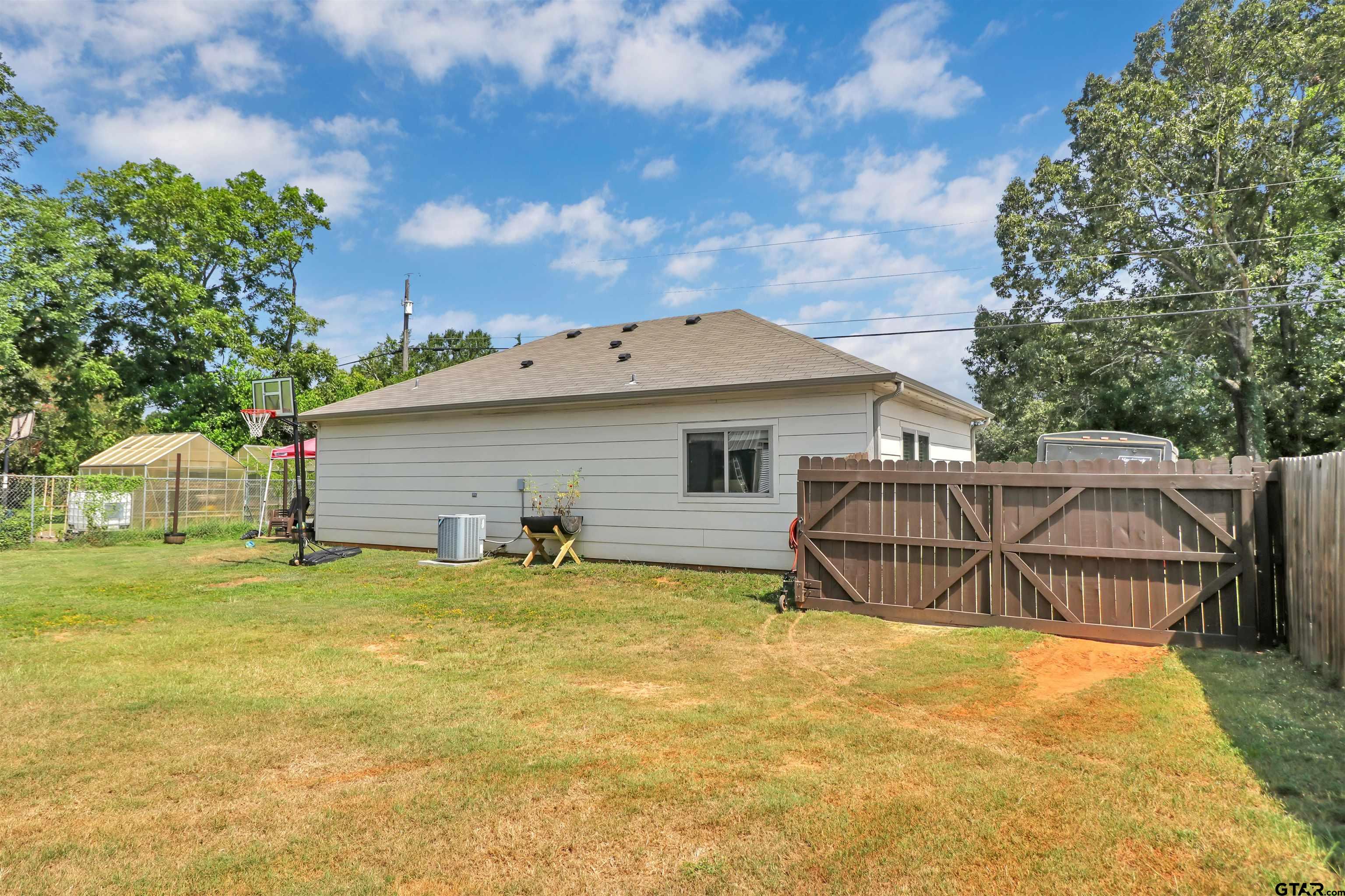 514 County Road 1201 Rusk, TX 75785 - Photo 28 of 29 a view of a house with backyard and sitting area