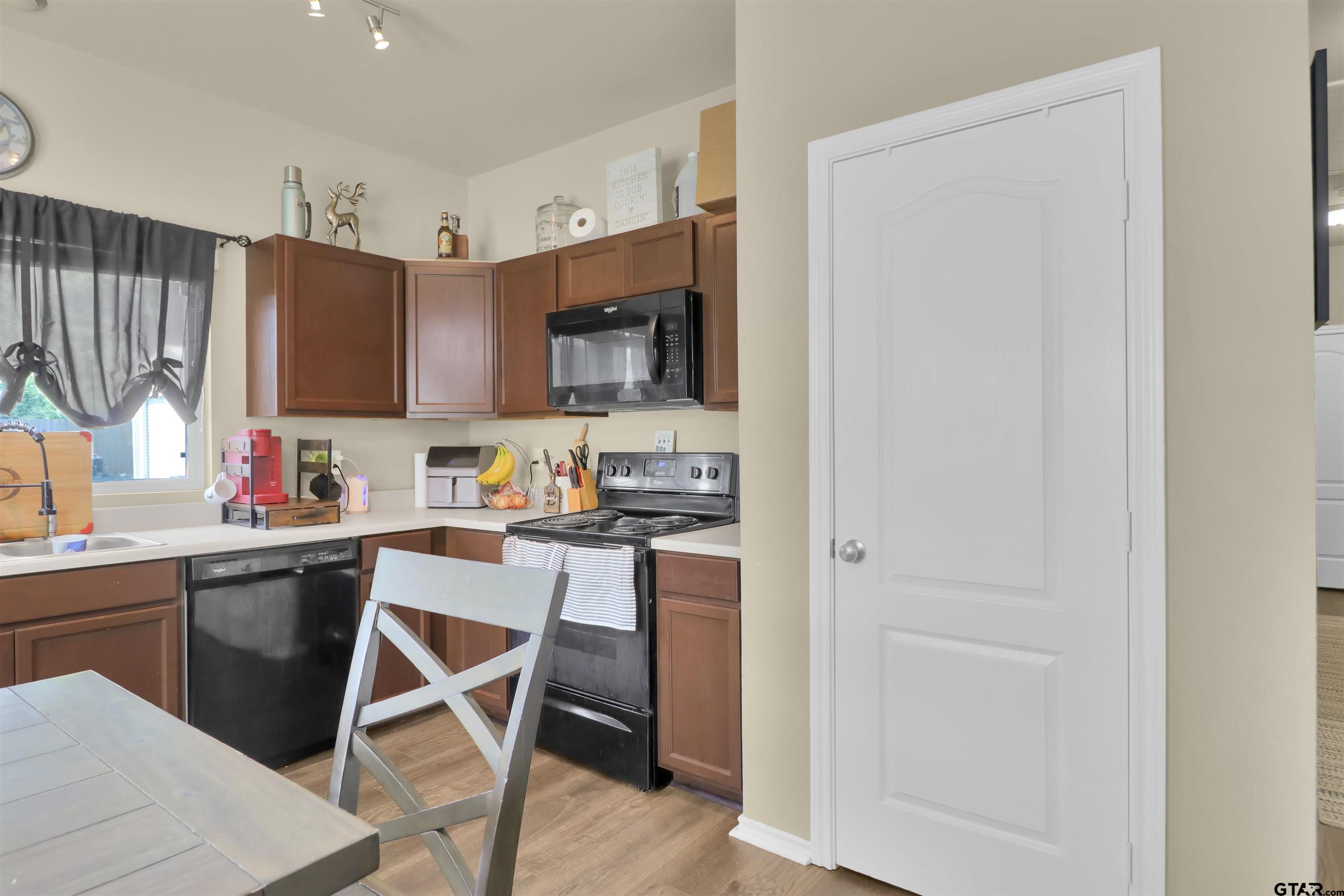 514 County Road 1201 Rusk, TX 75785 - Photo 9 of 29 a kitchen with stainless steel appliances granite countertop a refrigerator and a stove top oven