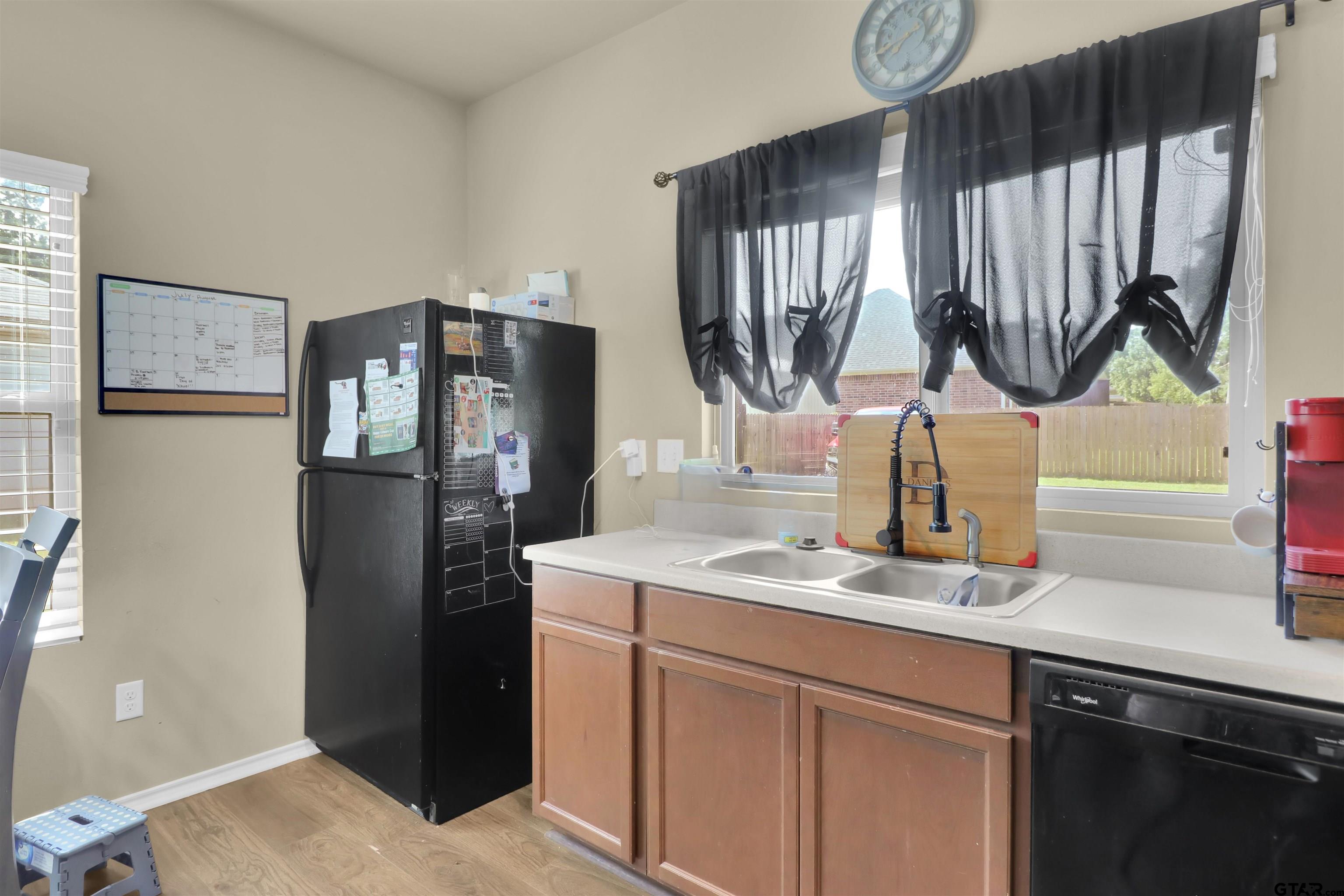 514 County Road 1201 Rusk, TX 75785 - Photo 10 of 29 a kitchen with stainless steel appliances granite countertop a refrigerator and a sink