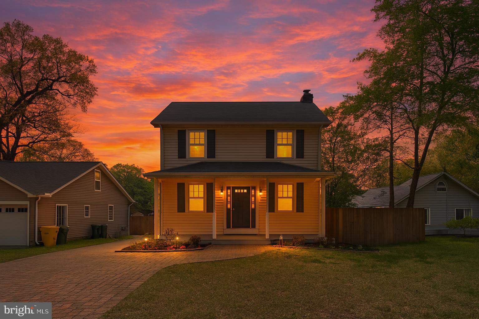 8364 Country Life Road Pasadena, MD 21122 - Photo 1 of 1 front view of a house with a yard