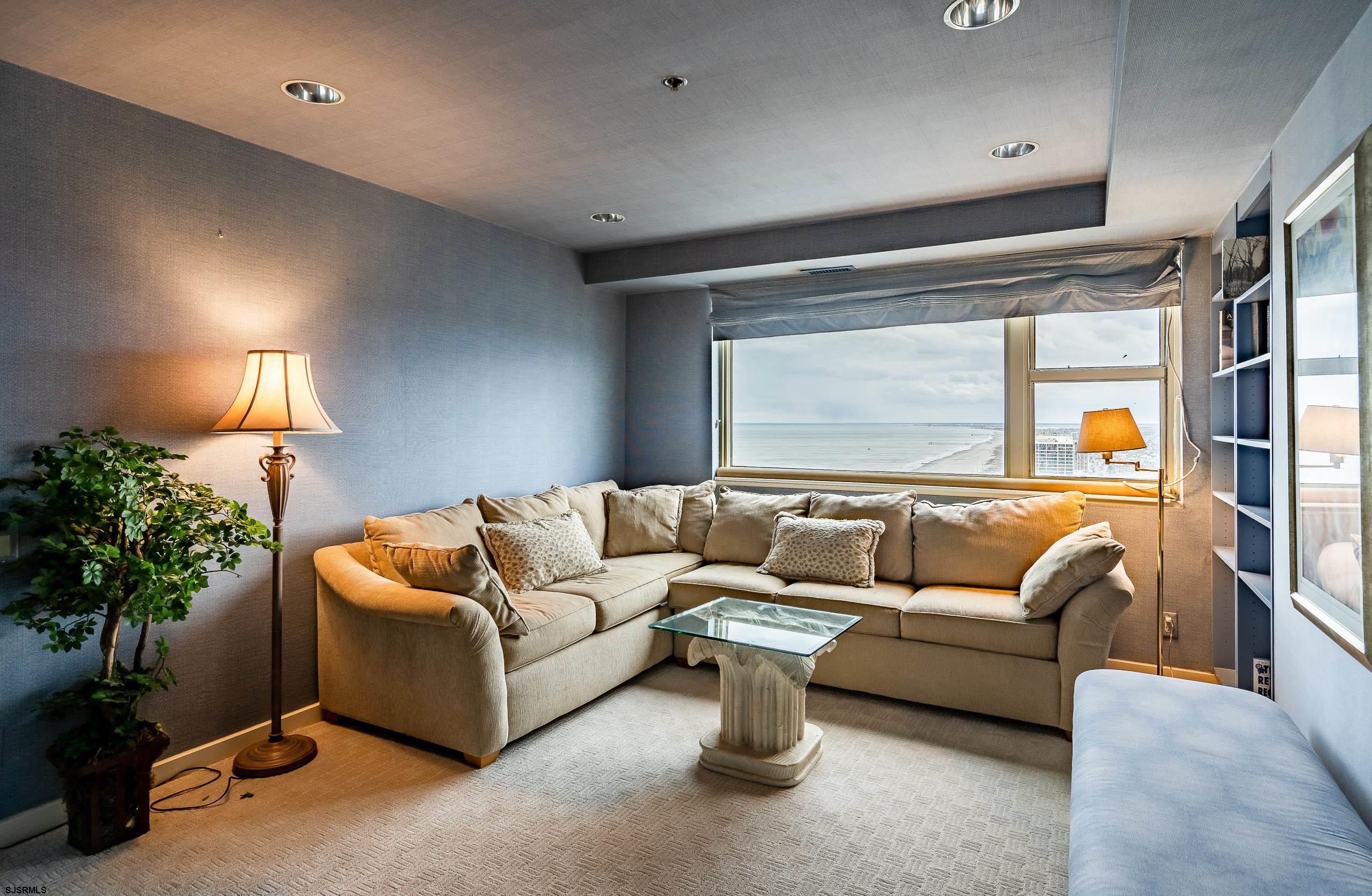 3101 Boardwalk, Unit CONDO Atlantic City, NJ 08401 - Photo 25 of 46 a living room with furniture and a large window