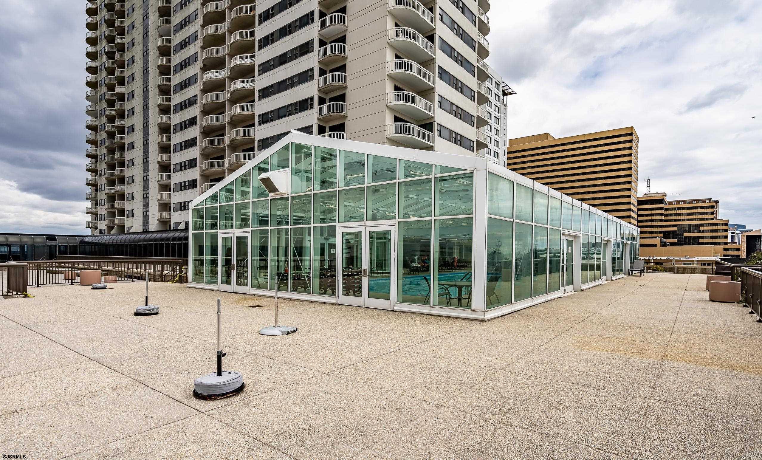 3101 Boardwalk, Unit CONDO Atlantic City, NJ 08401 - Photo 41 of 46 a view of a balcony with potted plants