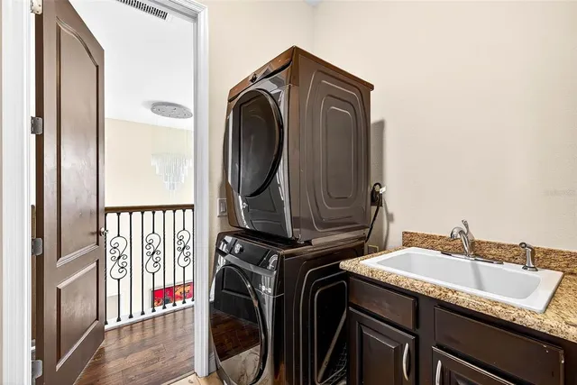 a utility room with dryer and washer