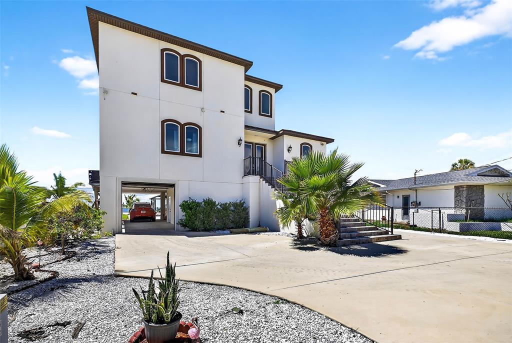 3532 West Shell Point Road Ruskin, FL 33570 - Photo 39 of 40 a front view of a house with a yard