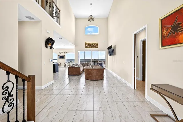 a view of living room with furniture and window