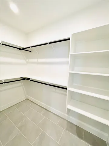 a view of a refrigerator in a kitchen