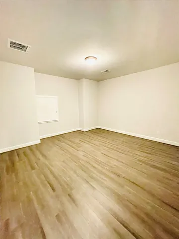 a view of a large pool with a fireplace and a large window