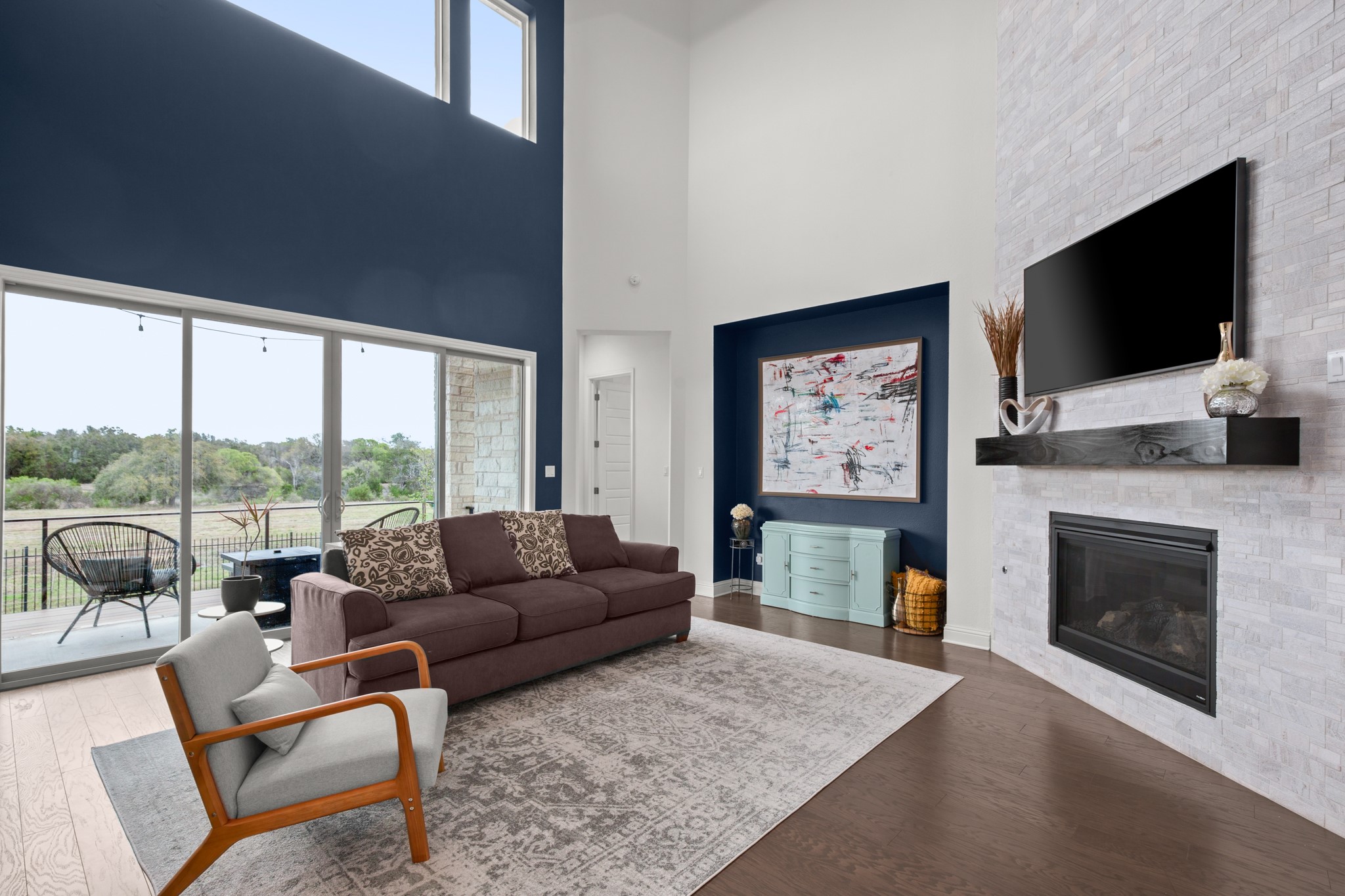 330 Cistern Way Austin, TX 78737 - Photo 12 of 40 a living room with fireplace furniture and a flat screen tv