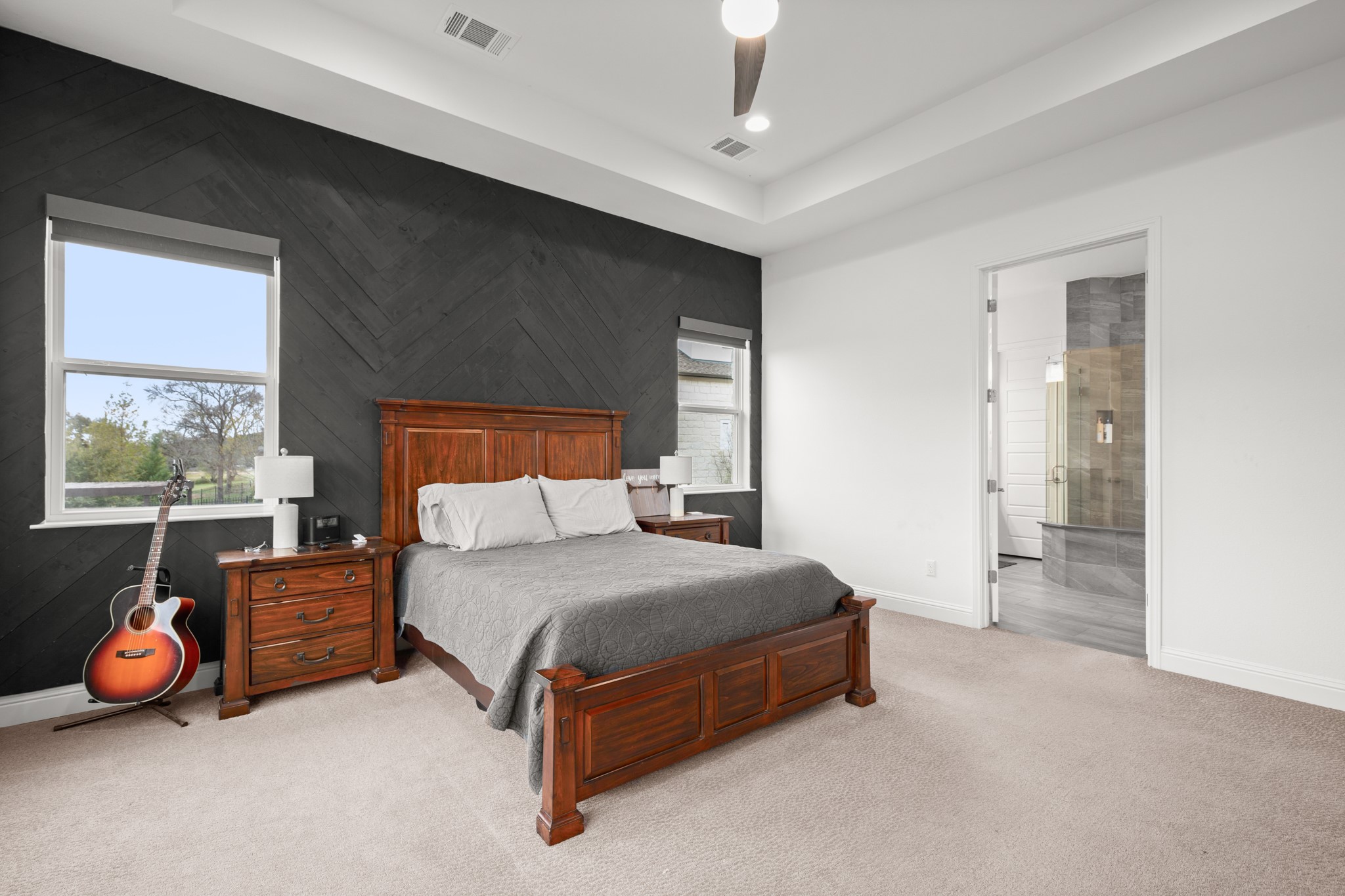 330 Cistern Way Austin, TX 78737 - Photo 17 of 40 a bedroom with a bed and a table