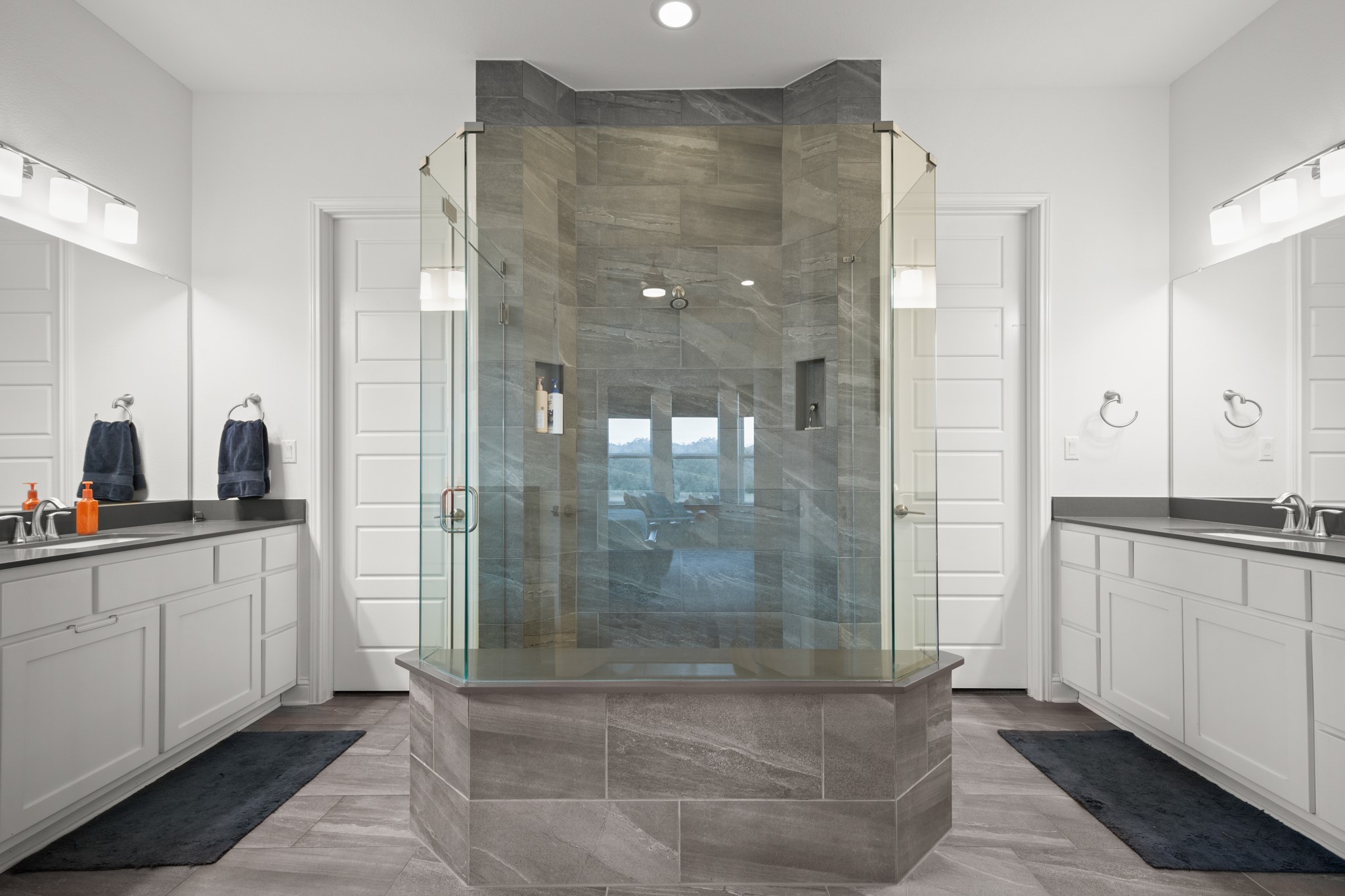 330 Cistern Way Austin, TX 78737 - Photo 18 of 40 a bathroom with a shower and a sink