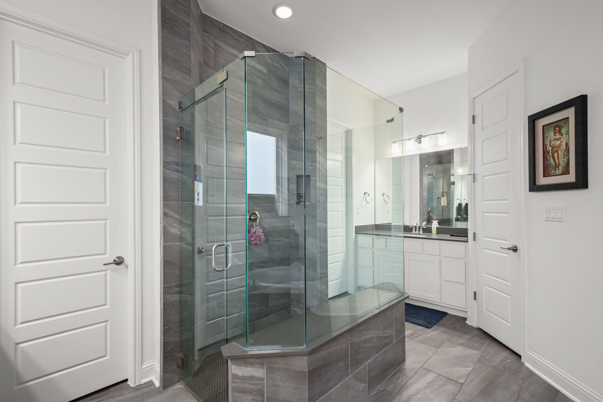 330 Cistern Way Austin, TX 78737 - Photo 19 of 40 a bathroom with a shower and a sink