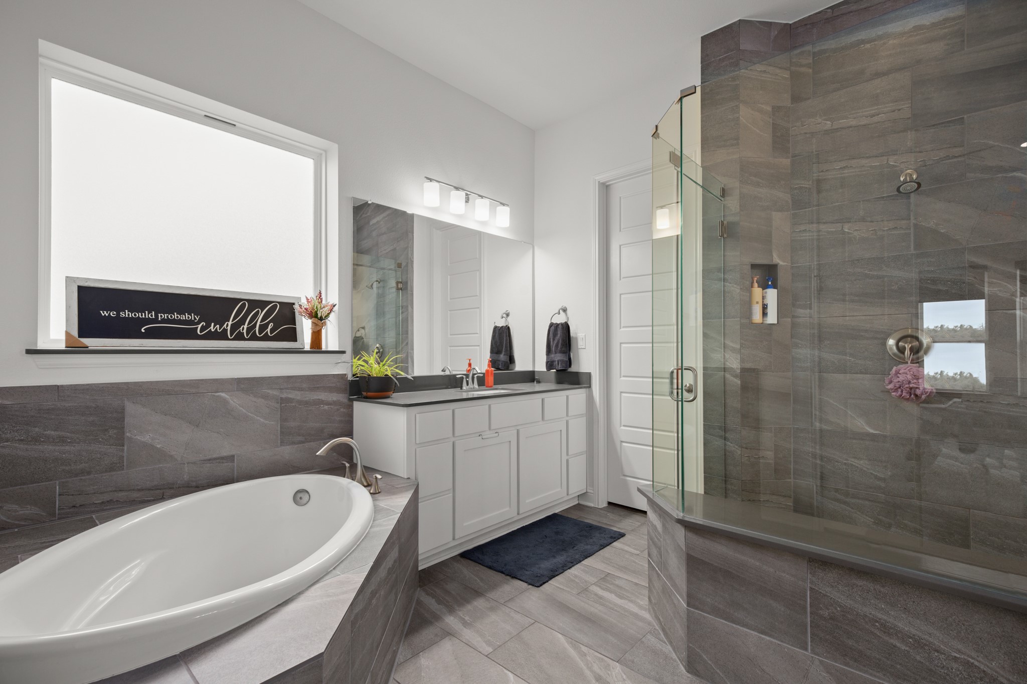 330 Cistern Way Austin, TX 78737 - Photo 20 of 40 a bathroom with a bathtub and a sink