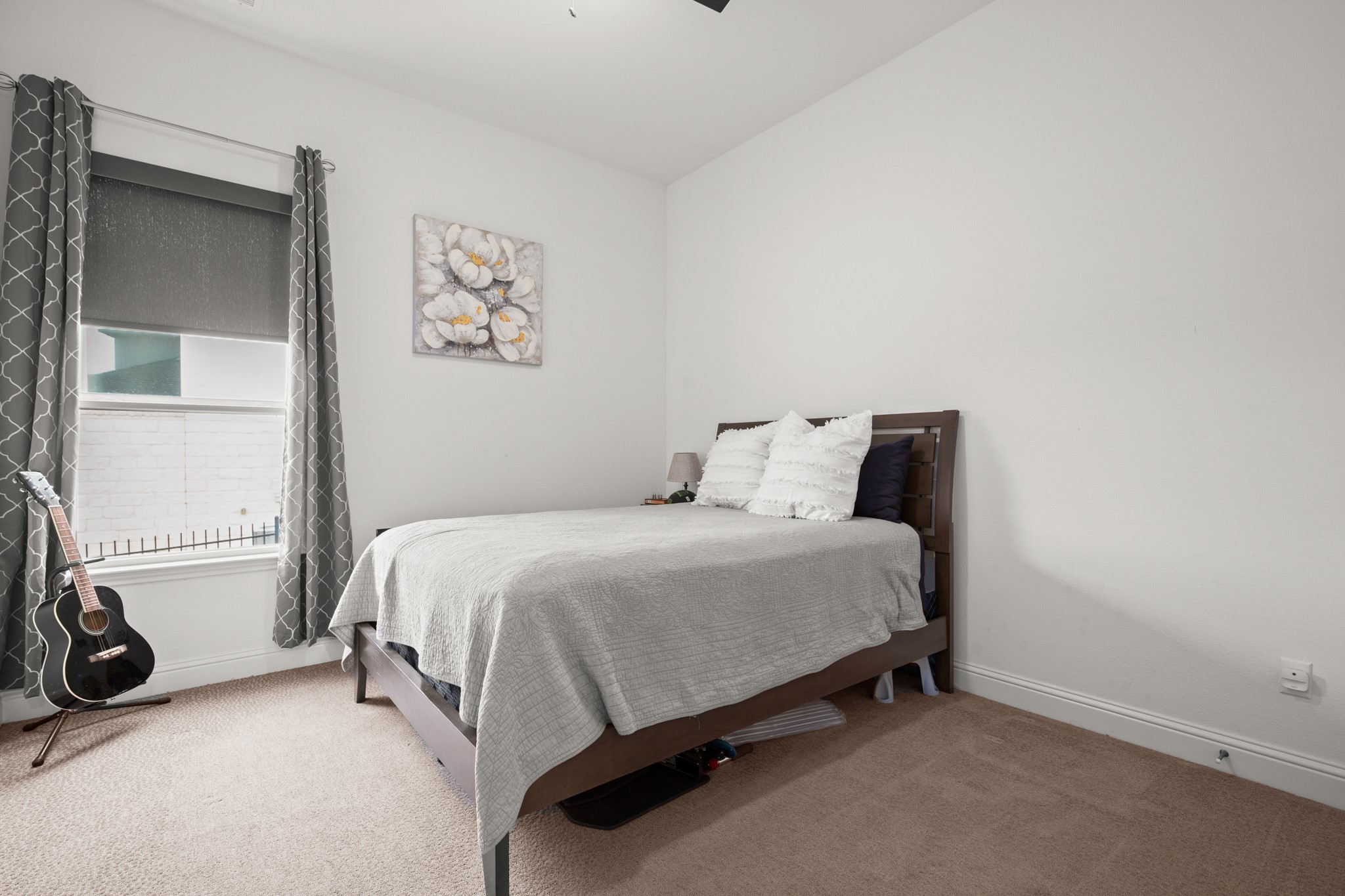 330 Cistern Way Austin, TX 78737 - Photo 21 of 40 a bedroom with a bed and a window