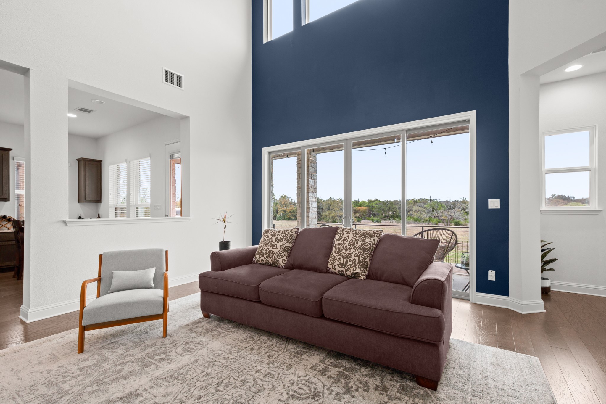 330 Cistern Way Austin, TX 78737 - Photo 25 of 40 a living room with furniture and a large window