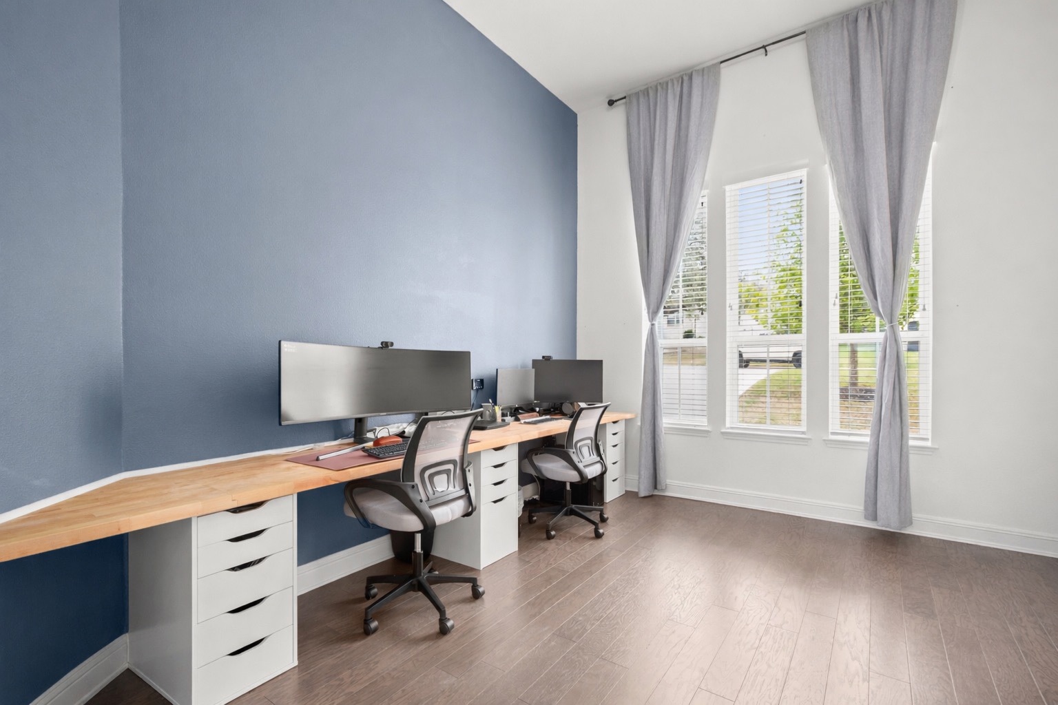 330 Cistern Way Austin, TX 78737 - Photo 26 of 40 a view of a workspace with furniture and a window