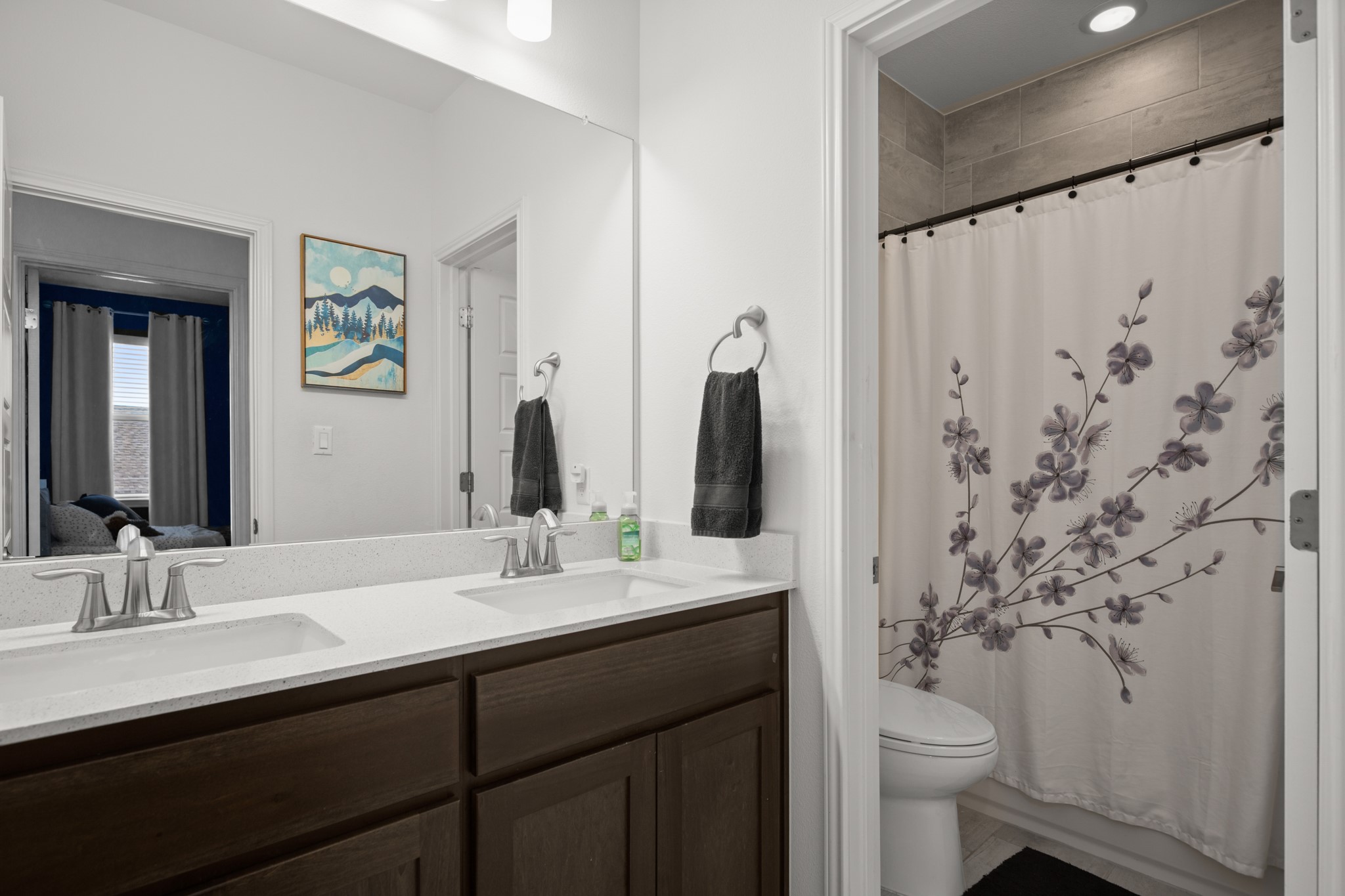330 Cistern Way Austin, TX 78737 - Photo 33 of 40 a bathroom with a granite countertop sink toilet and shower
