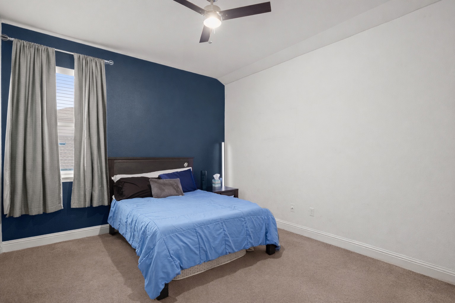 330 Cistern Way Austin, TX 78737 - Photo 34 of 40 a bedroom with a bed and window