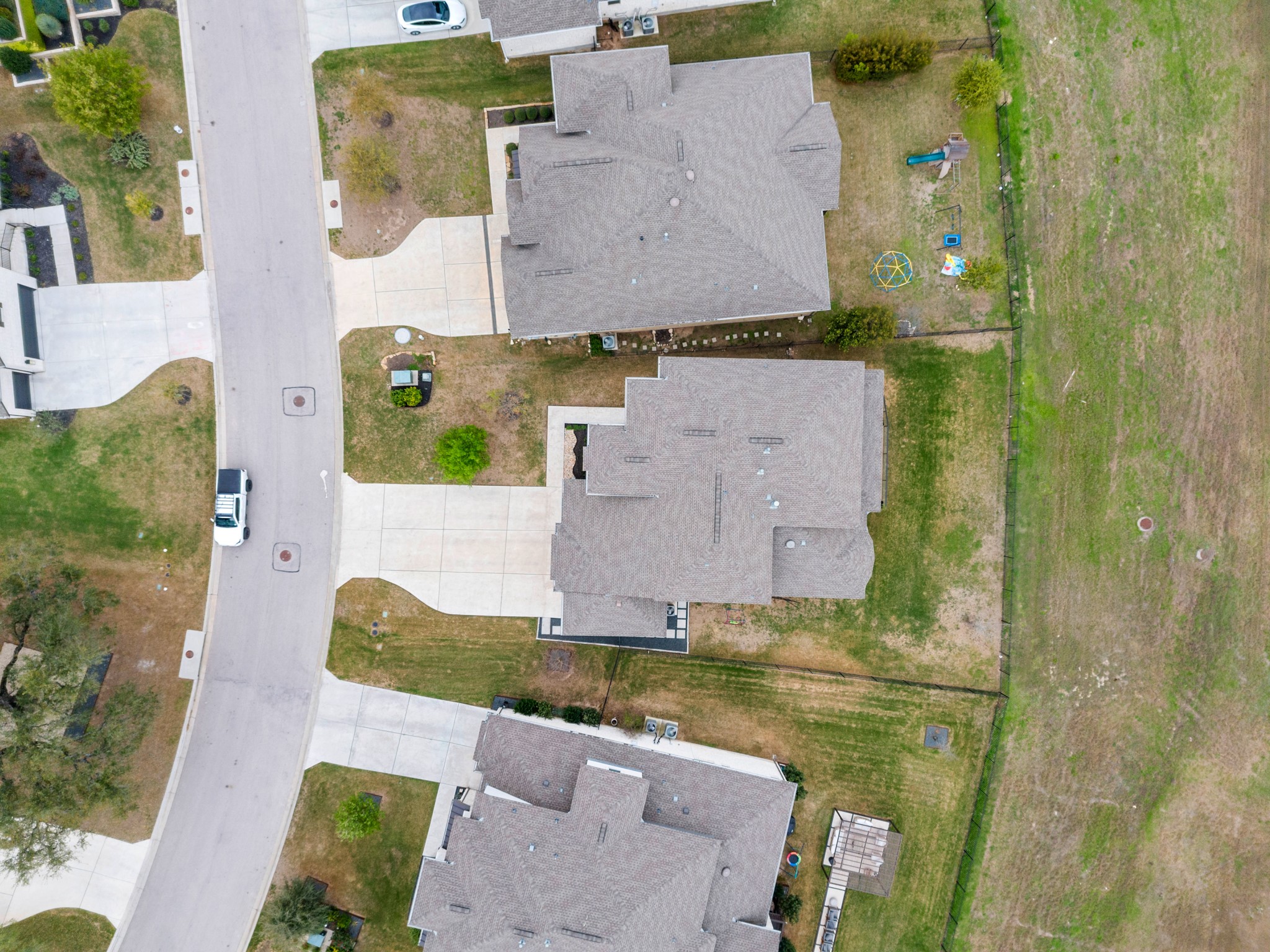 330 Cistern Way Austin, TX 78737 - Photo 5 of 40 an aerial view of a house with a swimming pool
