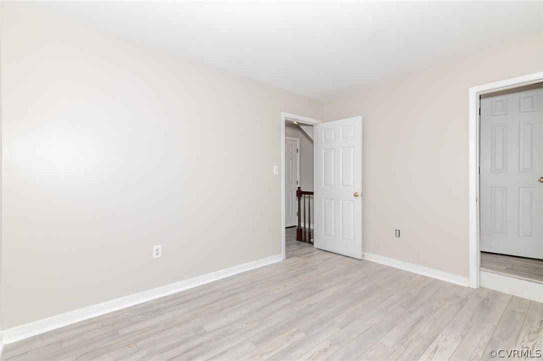 5505 Chestnut Bluff Road Midlothian, VA 23112 - Photo 28 of 44 a view of an empty room with wooden floor