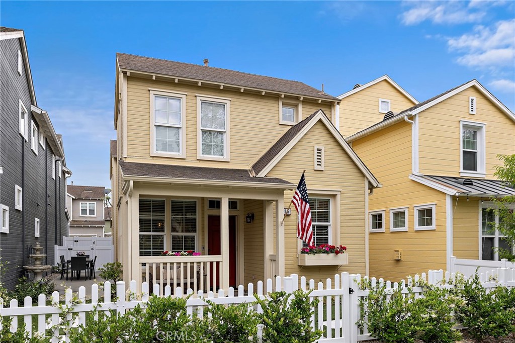 15 Honey Tree Ladera Ranch, CA 92694 - Photo 8 of 51 a view of a white house with large windows