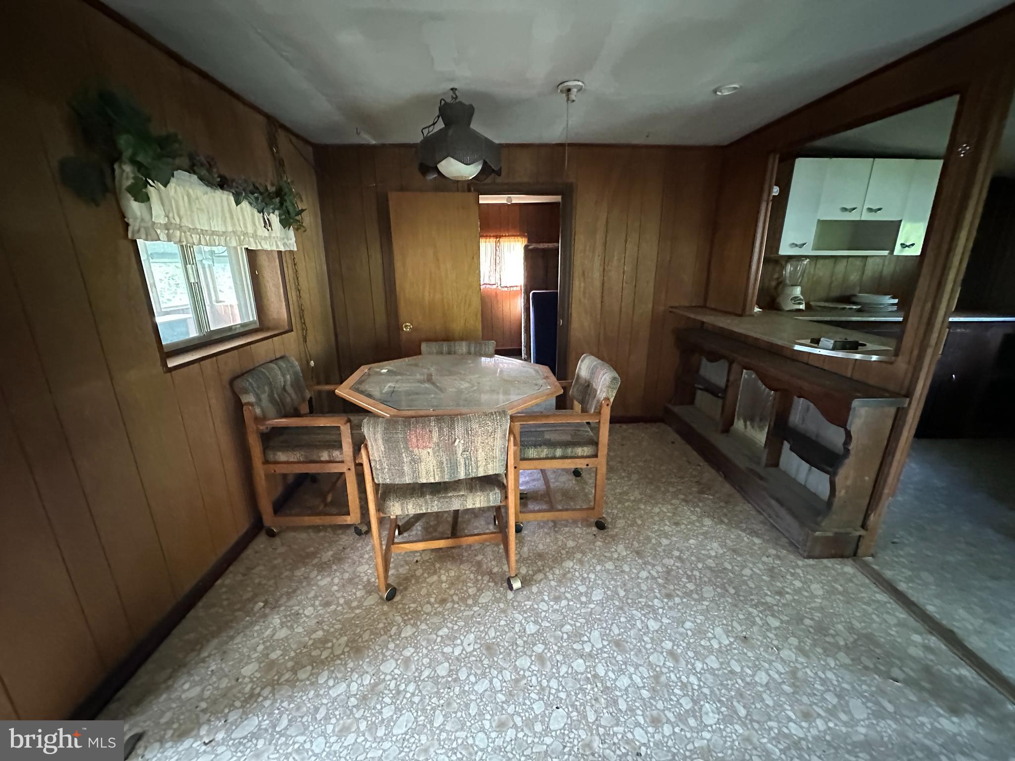 13726 Hopps Landing Road Hagerstown, MD 21740 - Photo 26 of 71 a dining room with furniture and window