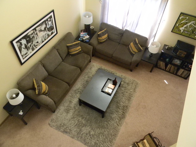 277 Grand Ridge Road, Unit 277 St. Charles, IL 60175 - Photo 3 of 13 a living room with furniture and a couch