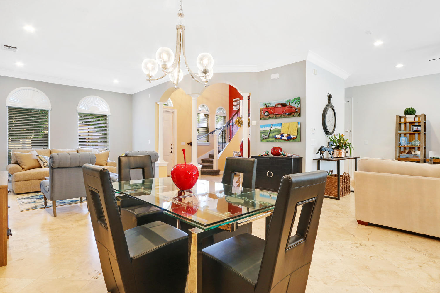 98 Via Poinciana Lane Boca Raton, FL 33487 - Photo 11 of 38 a view of a dining room with furniture and a chandelier
