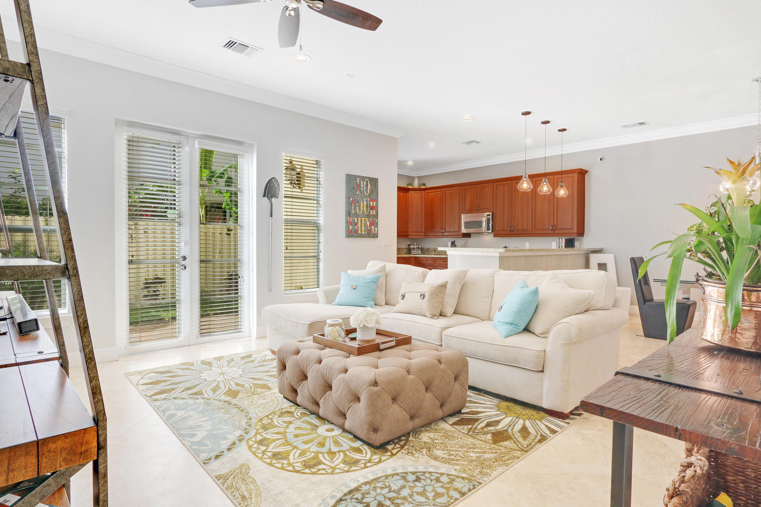 98 Via Poinciana Lane Boca Raton, FL 33487 - Photo 16 of 38 a living room with furniture and a large window
