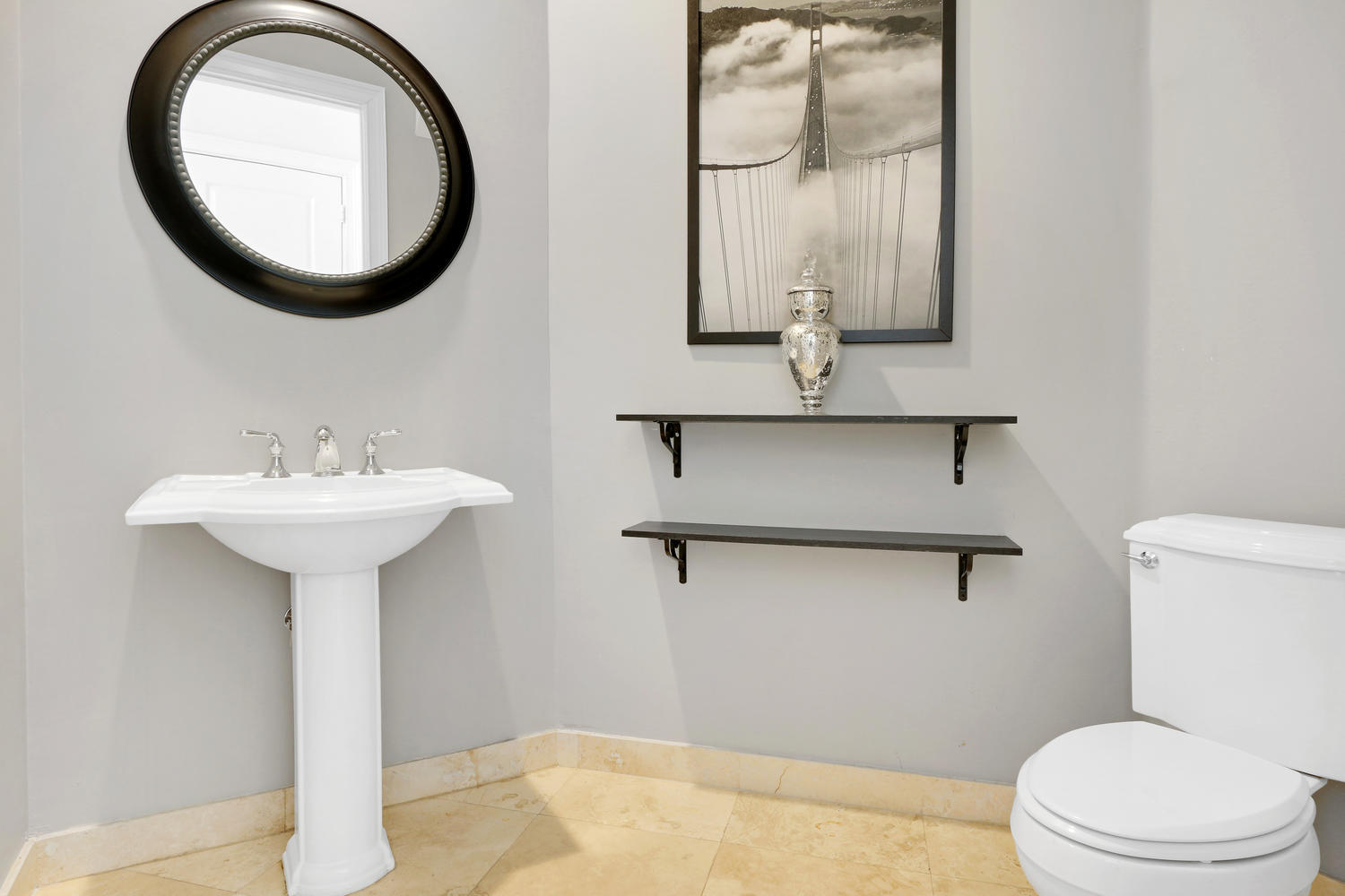 98 Via Poinciana Lane Boca Raton, FL 33487 - Photo 24 of 38 a bathroom with a sink a mirror and a toilet