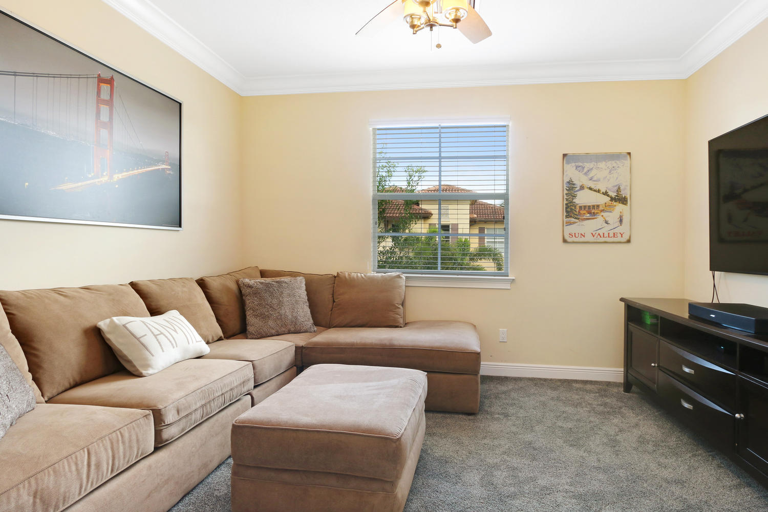 98 Via Poinciana Lane Boca Raton, FL 33487 - Photo 26 of 38 a living room with furniture and a flat screen tv
