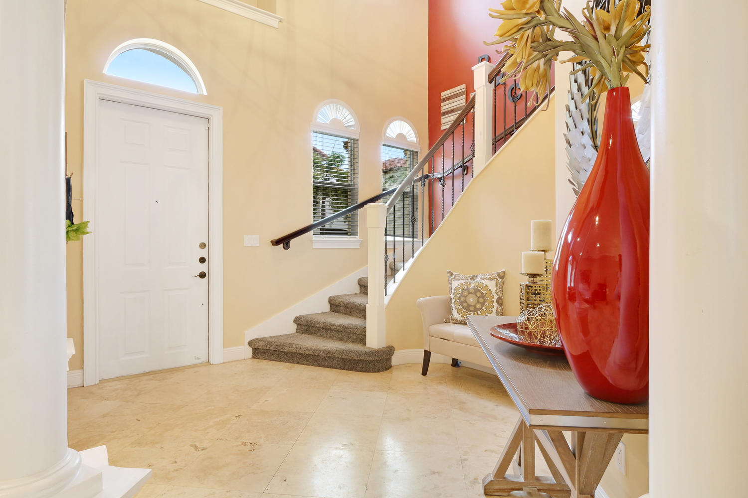 98 Via Poinciana Lane Boca Raton, FL 33487 - Photo 6 of 38 a view of entryway and hall with wooden floor