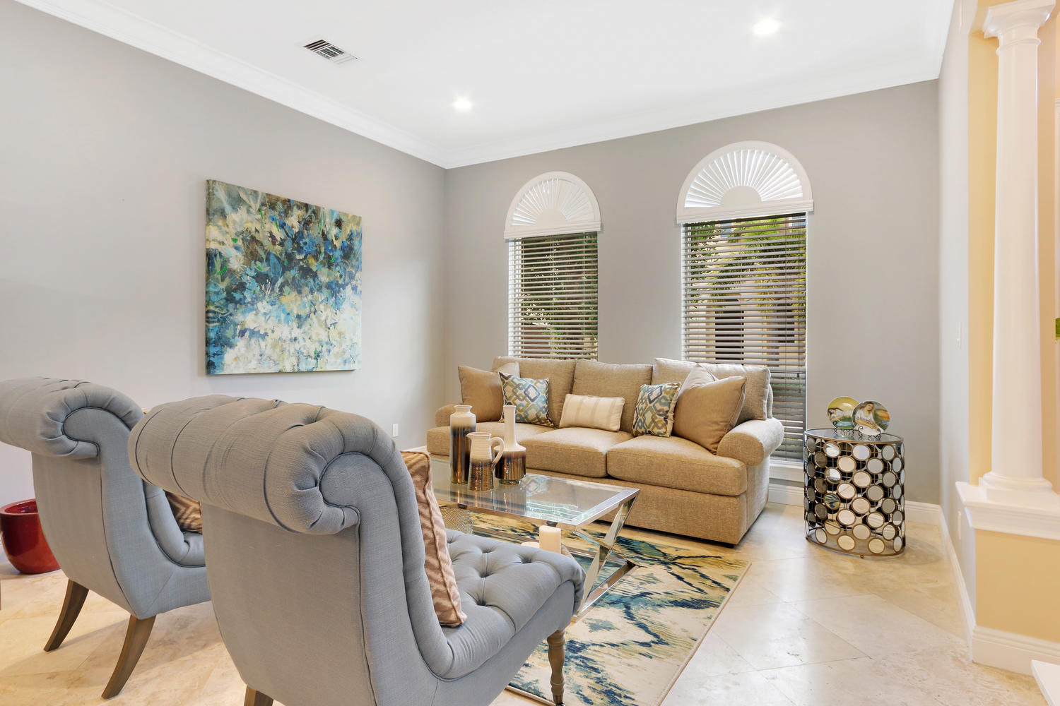 98 Via Poinciana Lane Boca Raton, FL 33487 - Photo 8 of 38 a living room with furniture and a large window