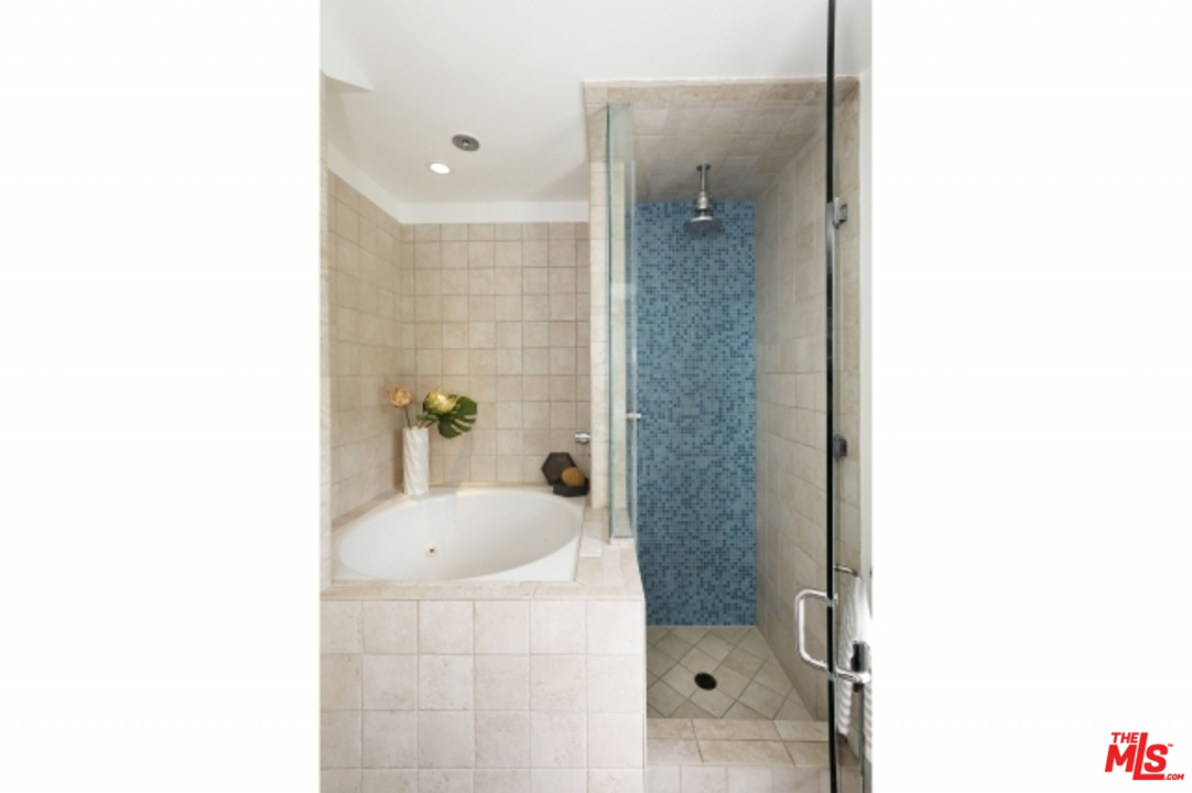 8400 Utica Drive Los Angeles, CA 90046 - Photo 22 of 32 a bathroom with a sink and a mirror