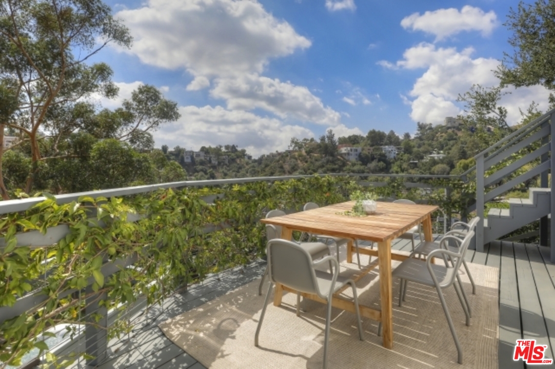 8400 Utica Drive Los Angeles, CA 90046 - Photo 26 of 32 a view of a balcony with furniture