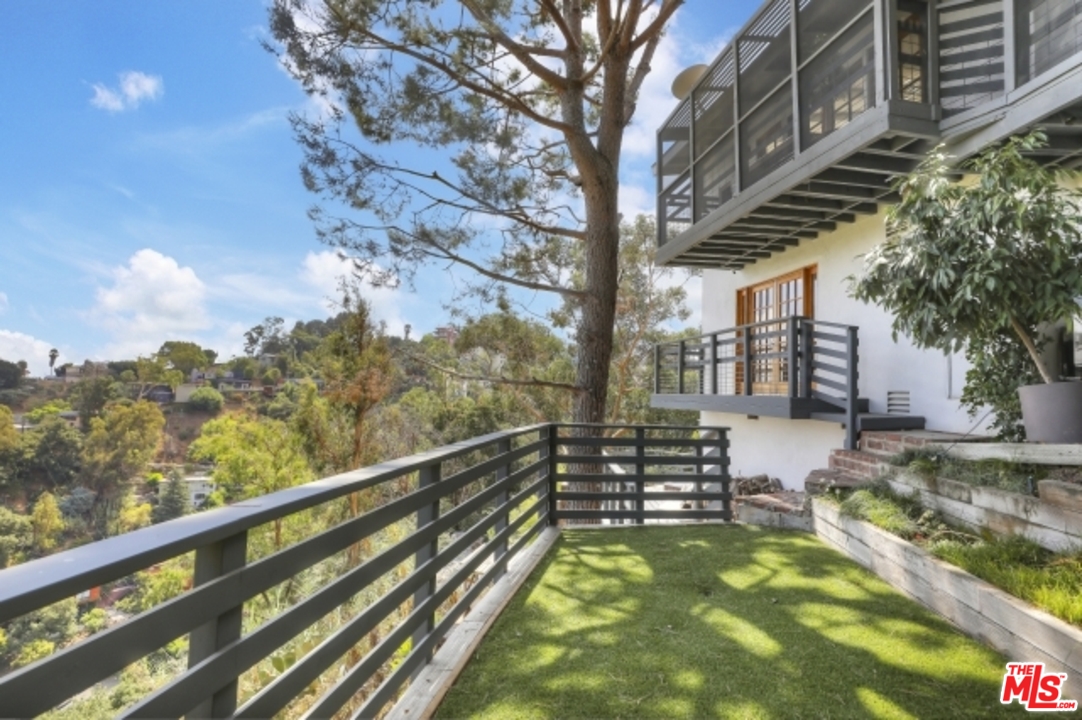 8400 Utica Drive Los Angeles, CA 90046 - Photo 28 of 32 a view of a two chairs next to a yard