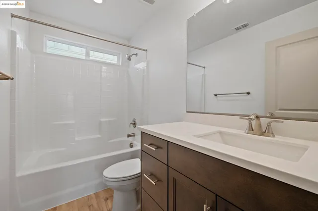 front view of a house with a rug