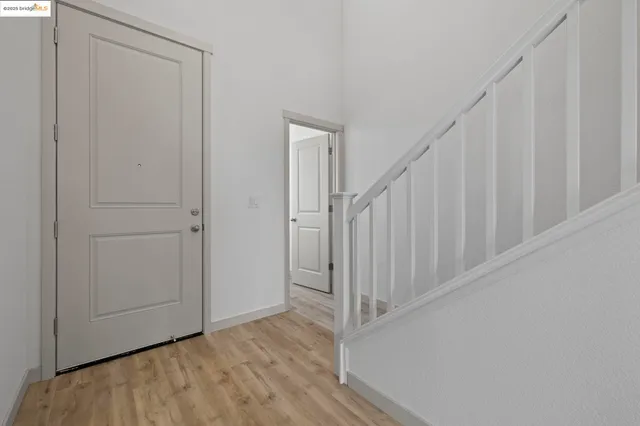 a kitchen with a sink stove and microwave