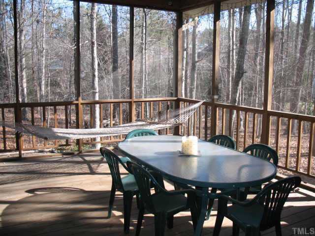 1809 Sarazen Place Raleigh, NC 27615 - Photo 9 of 9 a view of a dining room with furniture window and outside view