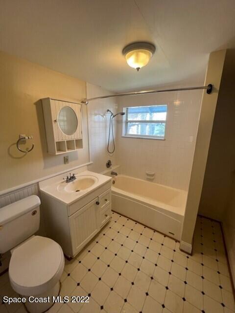 10 Olive Street Cocoa, FL 32922 - Photo 12 of 14 a bathroom with a sink toilet and shower