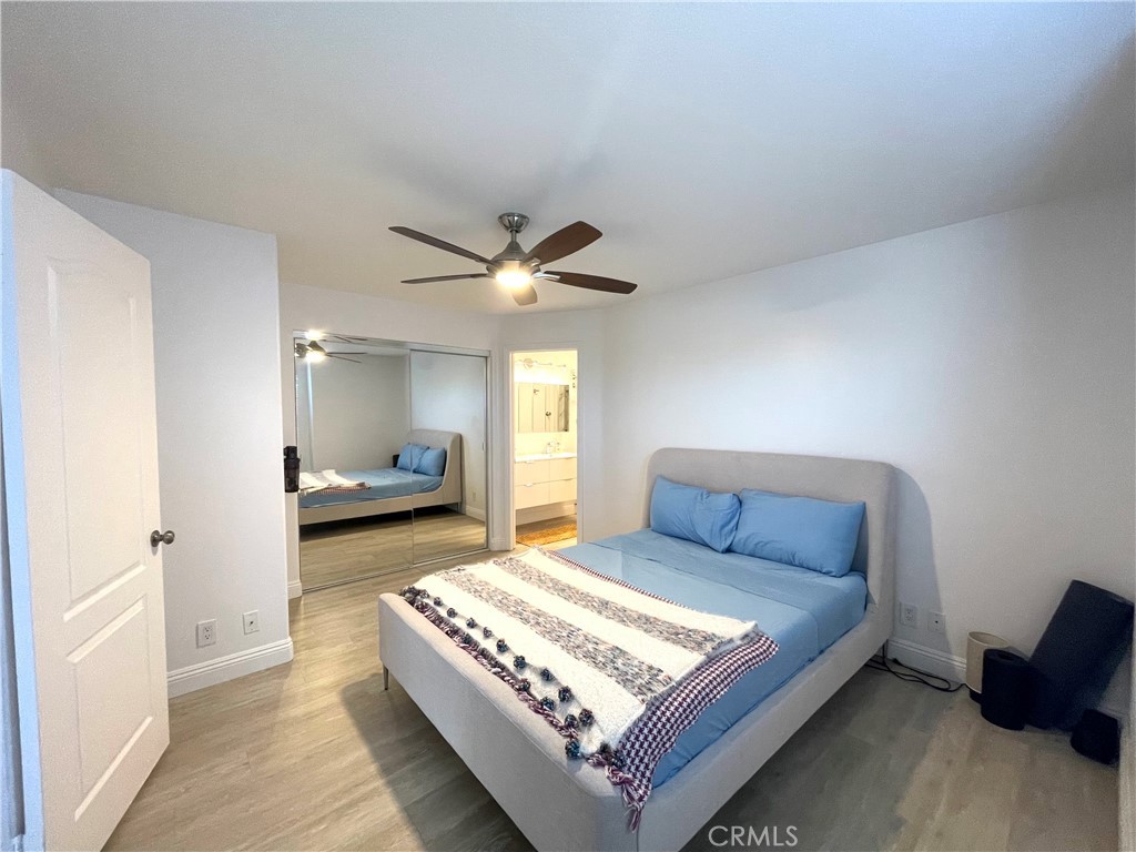 352 Y Place Laguna Beach, CA 92651 - Photo 13 of 22 a bedroom with a bed and window