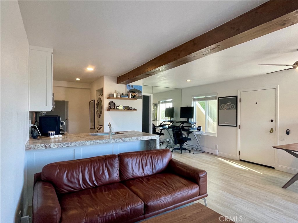 352 Y Place Laguna Beach, CA 92651 - Photo 15 of 22 a living room with furniture and a flat screen tv