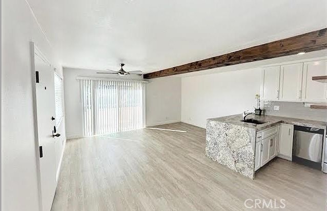 352 Y Place Laguna Beach, CA 92651 - Photo 6 of 22 a living room with stainless steel appliances granite countertop a hardwood floor and a sink