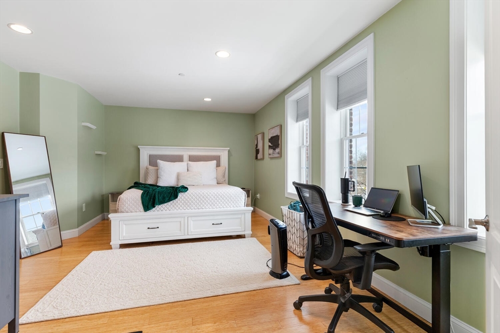 30 High Street, Unit 31 Medford, MA 02155 - Photo 18 of 27 a living room with furniture and a window