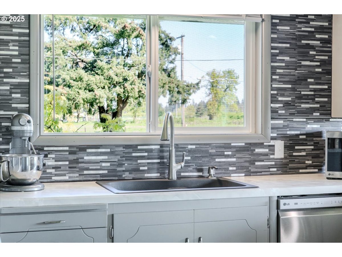 8668 Stayton Road Southeast Turner, OR 97392 - Photo 10 of 42 a kitchen sink with a window